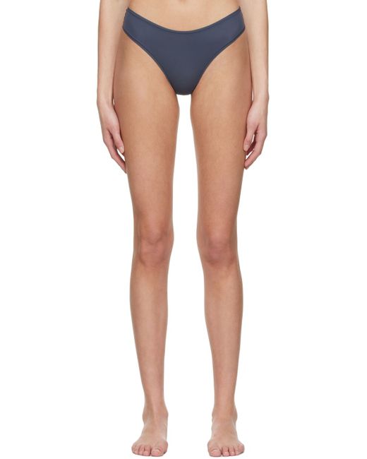 https://img.stylemi.co/unsafe/fit-in/520x650/filters:fill(fff)/https://img.stylemi.co/unsafe/0x0/products/ssense/27413886-skims-navy-fits-everybody-thong.jpg