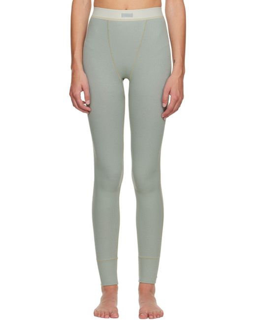 https://img.stylemi.co/unsafe/fit-in/520x650/filters:fill(fff)/https://img.stylemi.co/unsafe/0x0/products/ssense/35867433-skims-cotton-rib-leggings.jpg