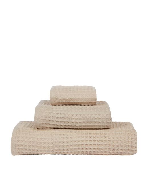 https://img.stylemi.co/unsafe/fit-in/520x650/filters:fill(fff)/products/harrods/35632630-uchino-air-waffle-bath-towel-70cm.jpg